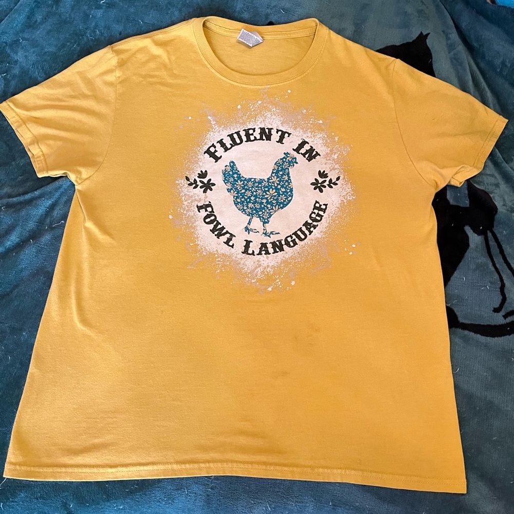 Woman’s size Large. Chicken shirt!! Fluent in Fowl Language